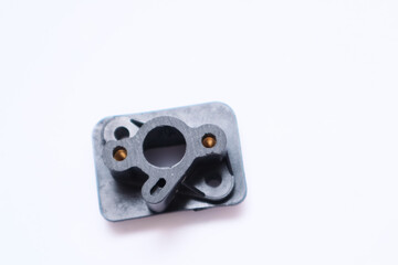 Carburetor intake manifold adapter for small two-stroke engines.