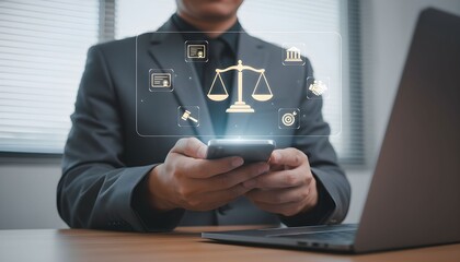 Businessman using smartphone with legal icons and scales of justice hologram representing digital law and online justice services