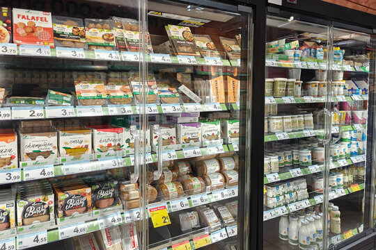 Finestrat, Spain - December 2, 2025: Carrefour Bio refrigerated section with organic products on display.