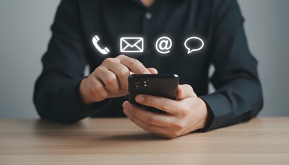 A person using a smartphone with various communication icons floating above it, symbolizing contact methods.