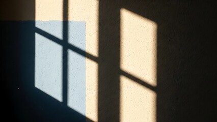 Geometric Shadow of a Window Frame Cast on a Textured Wall Painted with Contrasting Patches of Light Yellow and Blue