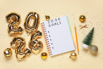 Notebook with to-do list, figure 2026 and Christmas decor on yellow background