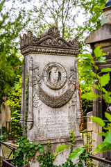 Monumental and ornated graves in the Cemetery of Pere Lachaise, largest cemetery in Paris, France, where many famous artists are buried.