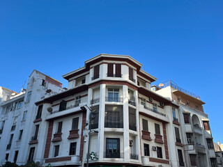 Obraz premium Art deco building facade against blue sky in Casablanca Morocco