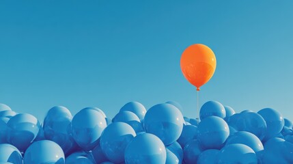 Orange balloon floating above a crowd of blue balloons against a clear sky