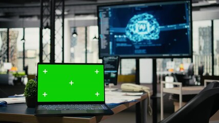 Green screen laptop in AI company office used to train predictive models for language processing tasks. Deep learning technology deployed on chroma key notebook in IT office - Powered by Adobe