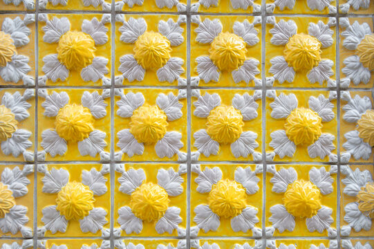 Abstract background of traditional and historic colourful textured Portuguese ceramic tiles called azulejos.