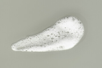 Smear of facial cleansing foam in trending color of year 2026.