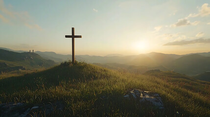 A wooden cross is on top of a hill in a grassy field