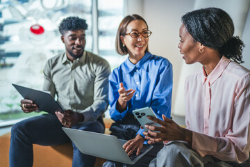 Diverse business team collaborating during an informal meeting