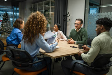 Diverse business team collaborating during a corporate meeting