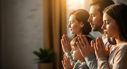 Family praying together in a moment of peace and reflection, bathed in warm sunlight