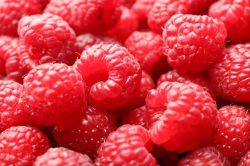 Fresh ripe raspberries as background, closeup view