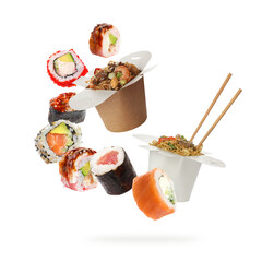 Asian food falling on white background. Sushi rolls and noodles