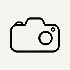 Aerial view of a vibrant cityscape with modern skyscrapers towering over a bustling street and a clear blue sky