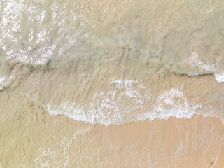 Aerial top view beach sea waves surface nature background
