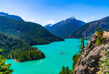 Nature landscape. Diablo Lake in North Cascades National Park. Scenic nature view over Diablo lake. Diablo lake with mountain landscape. Landscape mountain and Diablo lake. Touristic place
