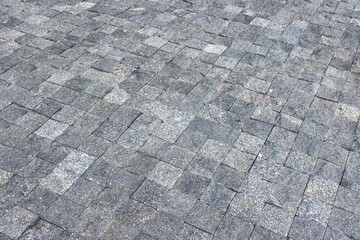 Square stone blocks sidewalk pattern background