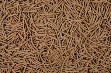 High fibre bran sticks breakfast cereal background texture detail