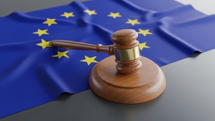 A wooden gavel rests on a wrinkled blue flag with yellow stars, symbolizing law and governance
