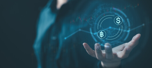 A futuristic digital finance concept showing cryptocurrency and currency exchange icons floating above a hand, symbolizing blockchain technology, virtual assets, and global financial transactions.