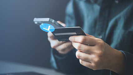 payment, cashless, digital, transaction, finance, A person makes a secure digital payment using a credit card and smartphone, representing cashless transactions and modern financial technology.