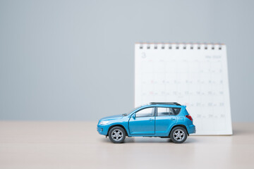 buy, buying, car, lease, dealership, agreement, signing, key, A toy car placed in front of a...
