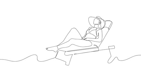 Obraz premium Bikini-clad woman lying on a beach chair in one continuous line. simple linear style. Doodle vector illustration Editable stroke.