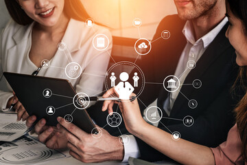 A concept of centralized business management and corporate strategy. A leadership team connecting to all functions like finance, operations, and planning. Motif