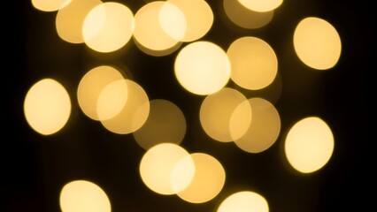Golden Bokeh Lights Abstract Background.
