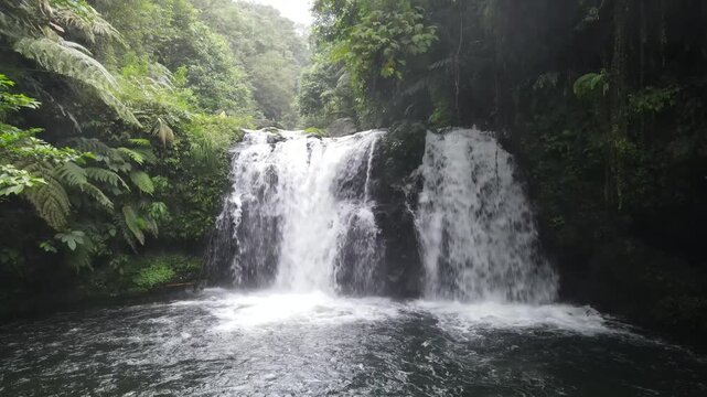 Aerial Footage of Sebrangan Waterfall Surrounded by Bamboo Forest, Java Island, Indonesia