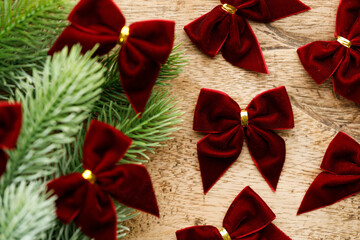 Red ribbons with pine branches, Christmas tree concept.