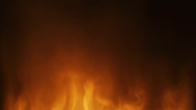 Intense orange flames rise vertically in a dramatic close-up against a dark, smoky background.