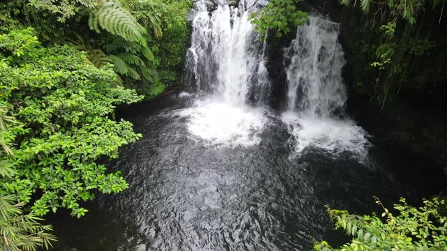Aerial Footage of Sebrangan Waterfall Surrounded by Bamboo Forest, Java Island, Indonesia