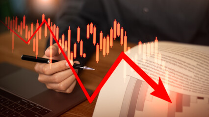 conceptual financial downturn graphic representing bankruptcy, market volatility, economic...