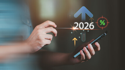 A conceptual illustration of financial forecasting and rising economic indicators for 2026, highlighting market growth, interest rate direction, digital analytics, and long-term strategic planning.