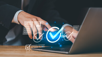 business professional interacting with digital check marks and quality icons, symbolizing online verification, approval processes, performance evaluation, efficient workflow management