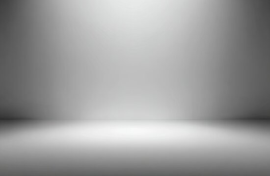 Minimalist gray gradient studio background with light reflecting from floor