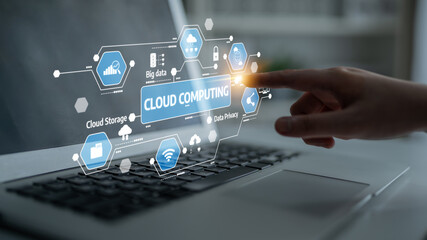 A hand interacts with a laptop screen displaying cloud computing icons, symbolizing data privacy and storage solutions in the digital technology landscape. Tessel