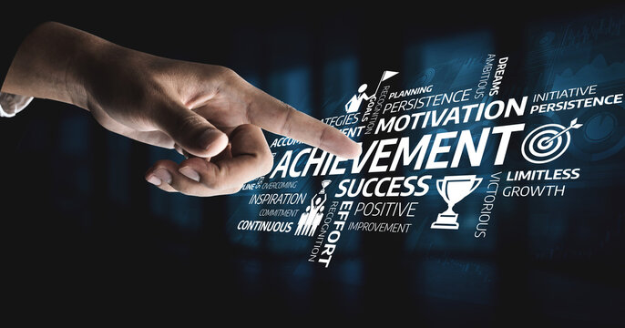 A striking visual representation of achievement and success, showing a hand pointing towards motivational words that inspire growth and persistence in personal and professional pursuits. Tessel