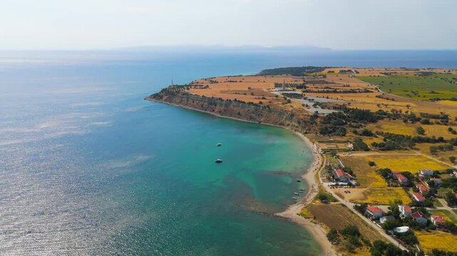 Seddulbahir, Eceabat, Turkey. Panoramic aerial view of Helles Memorial obelisk and Mehmetcik Feneri lighthouse with Aegean Sea and Dardanelles Strait on clear day. Aerial View