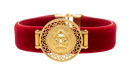 Luxurious red velvet bracelet adorned with an intricate gold lion head medallion, a symbol of strength and elegance, isolated against a crisp white background