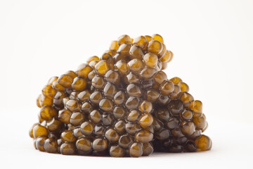 Macro shot of fresh caviar on white