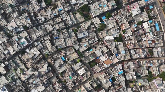 Drone view of Mathura&rsquo;s landscape with historic temple complexes and tightly packed residential areas, offering a glimpse of its deep-rooted spiritual culture.