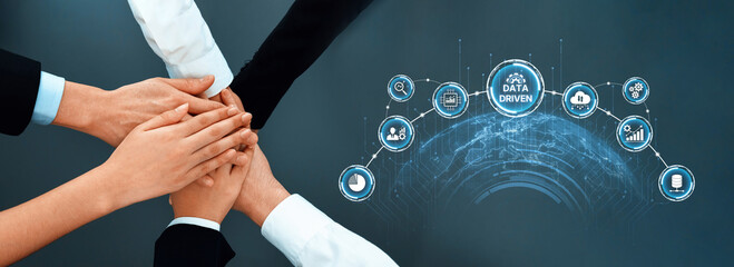 A diverse team of professionals uniting hands in a collaborative gesture, symbolizing commitment to a data-driven strategy for effective decision-making and growth. Trope