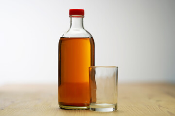 apple cider vinegar on table top.