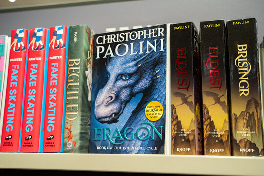 View of fantasy novels including Eragon series on bookstore shelf. Toronto, Canada - December 3, 2025.