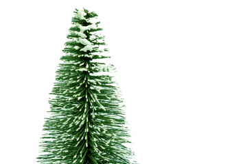Miniature Christmas tree with snow on white background, holiday season concept