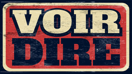 Fototapeta premium Aged and worn voir dire sign on wood