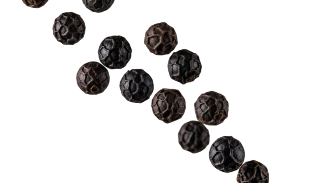 Diagonal line of aromatic black peppercorns on pure white backdrop featuring rich textures and details offering versatile culinary applications - Powered by Adobe